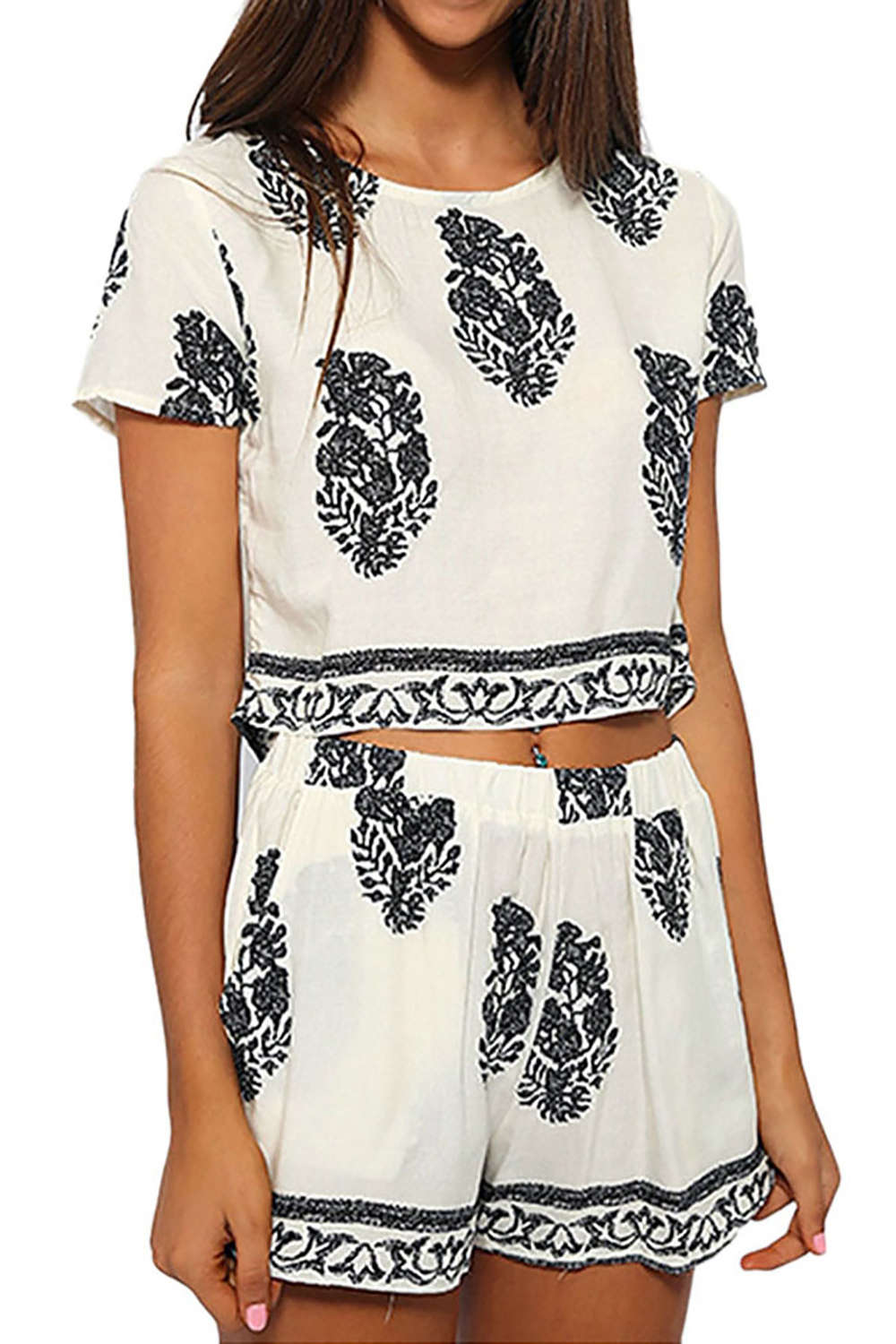 A flounced top and bottom set in tropical prints A flounced top and bottom set in tropical prints